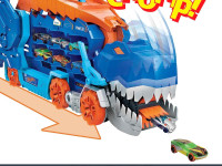 hot wheels hng50 Мегатранспортер "t-rex" с 2 машинками