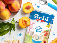 bebi premium terci de fulgi de ovaz cu lapte si piersici (5 m+) 200 gr.